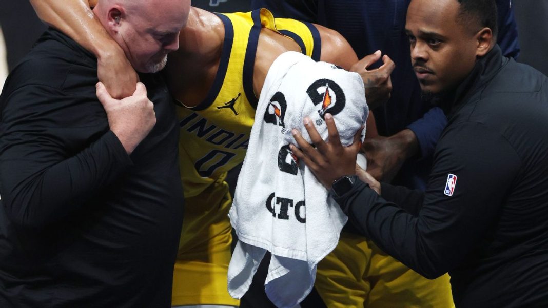 Haliburton exits with Achilles injury, father says