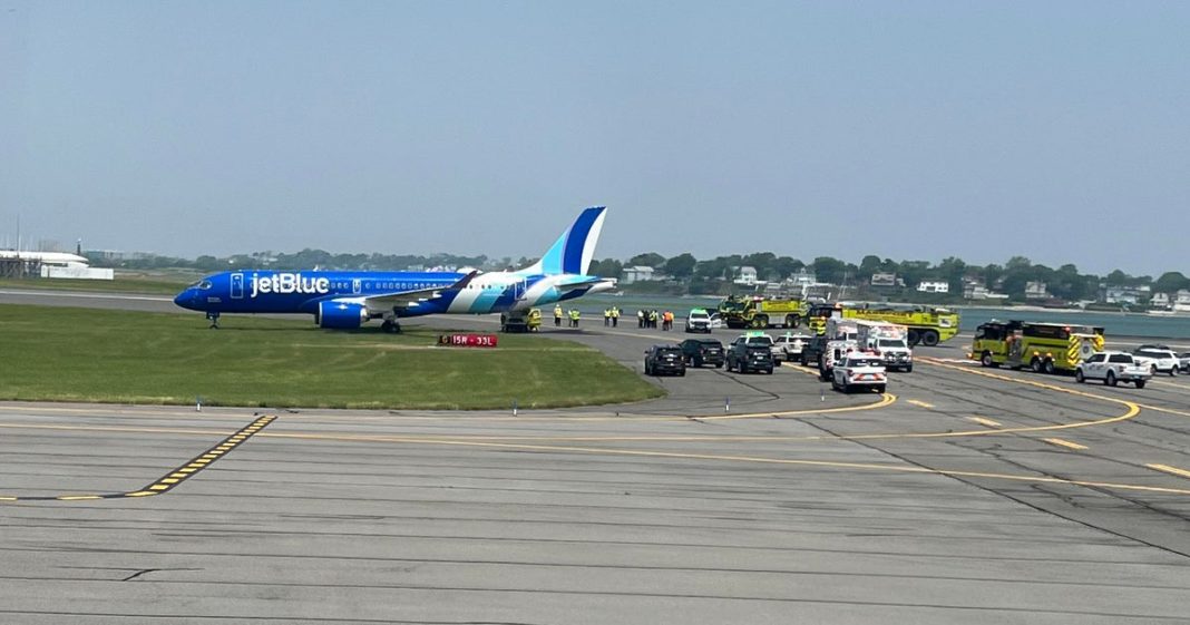 JetBlue flight rolls off runway at Boston's Logan Airport upon arrival from Chicago