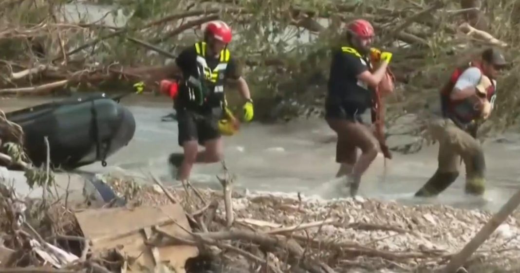 Texas flood rescue crews navigate tough terrain to search for missing